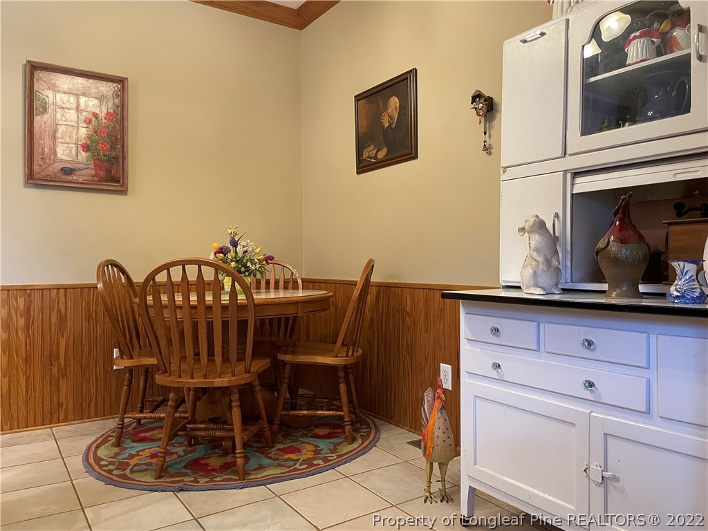 127 Doane Ranch Road Raeford, NC 28376 - Photo 24 of 47 a view of a dining room with furniture