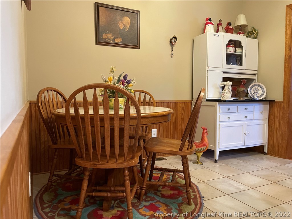 127 Doane Ranch Road Raeford, NC 28376 - Photo 25 of 47 a view of a chairs and table in a kitchen
