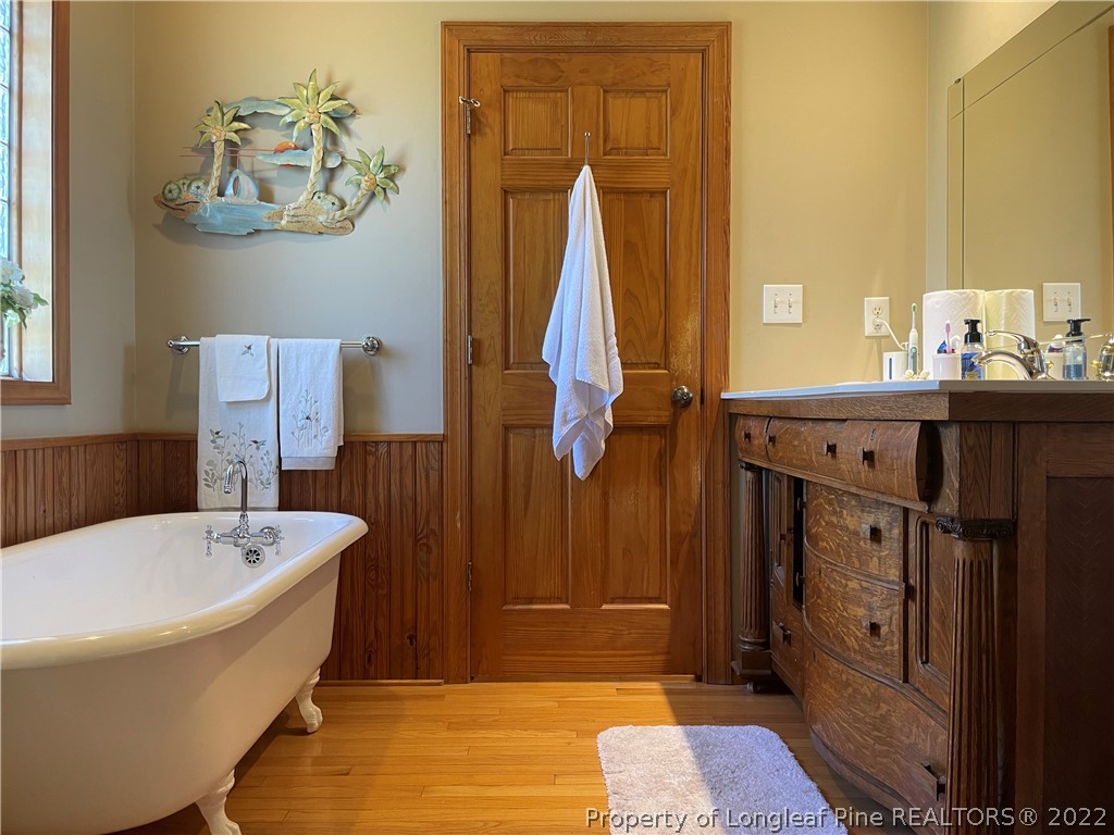 127 Doane Ranch Road Raeford, NC 28376 - Photo 28 of 47 a spacious bathroom with a bathtub and a sink