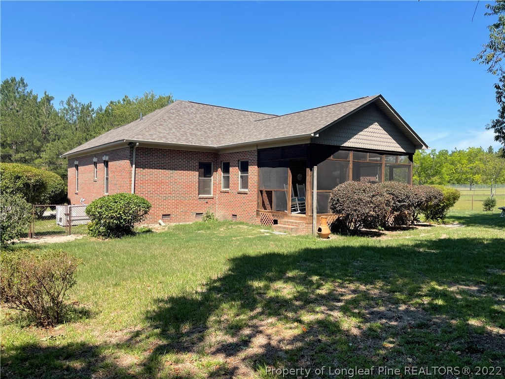 127 Doane Ranch Road Raeford, NC 28376 - Photo 42 of 47 a front view of a house with a yard