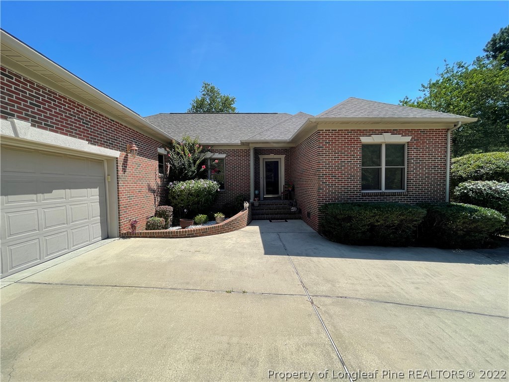 127 Doane Ranch Road Raeford, NC 28376 - Photo 5 of 47 a view of a house with a yard