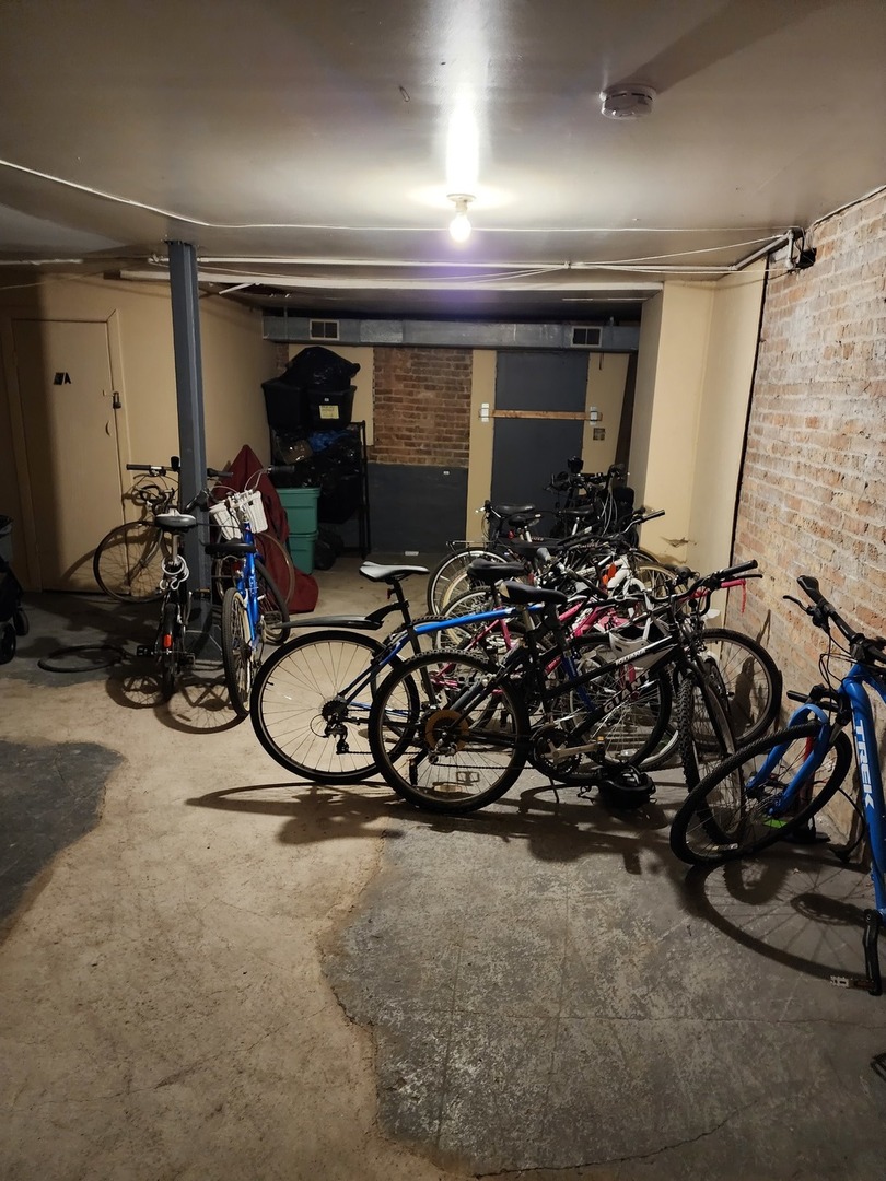 900 West Margate Terrace, Unit 2A Chicago, IL 60640 - Photo 20 of 21 a view of a room with gym equipment