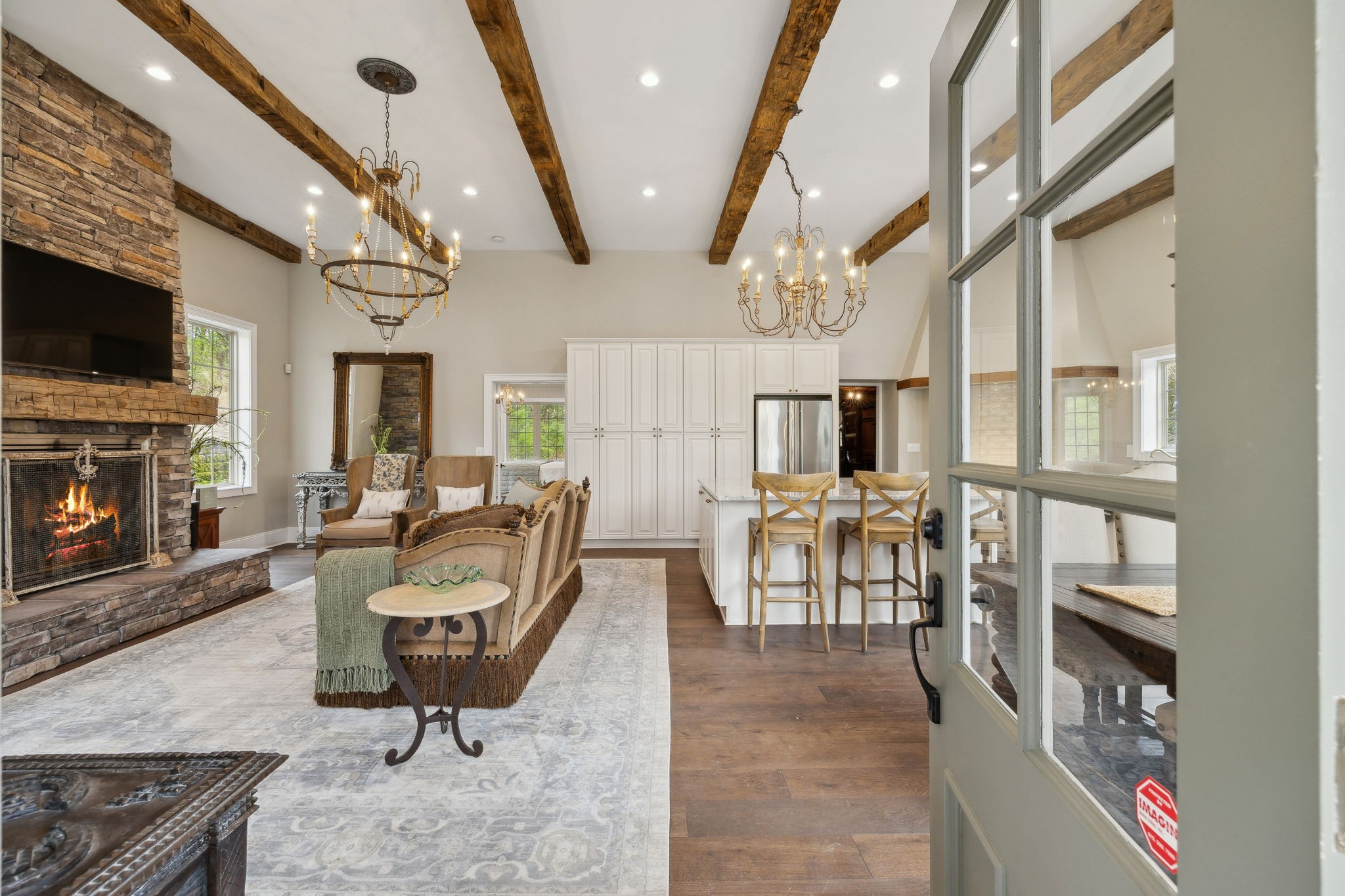3110 McMillan Road Franklin, TN 37064 - Photo 12 of 96 a living room with furniture a flat screen tv and a fireplace