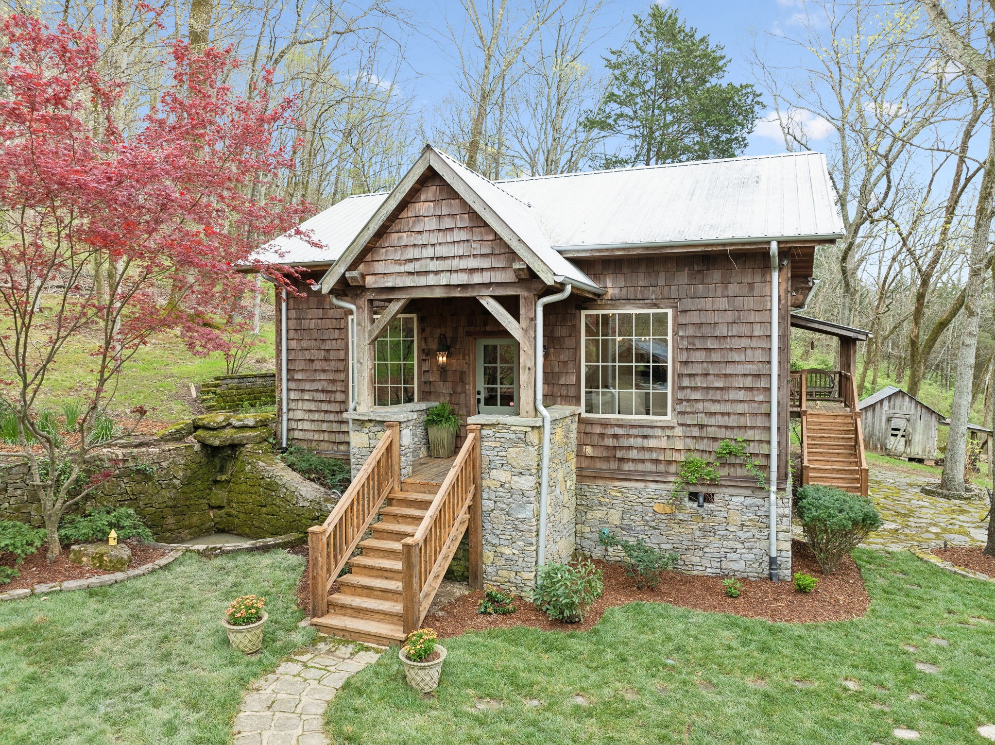 3110 McMillan Road Franklin, TN 37064 - Photo 2 of 96 a view of a small house with a yard