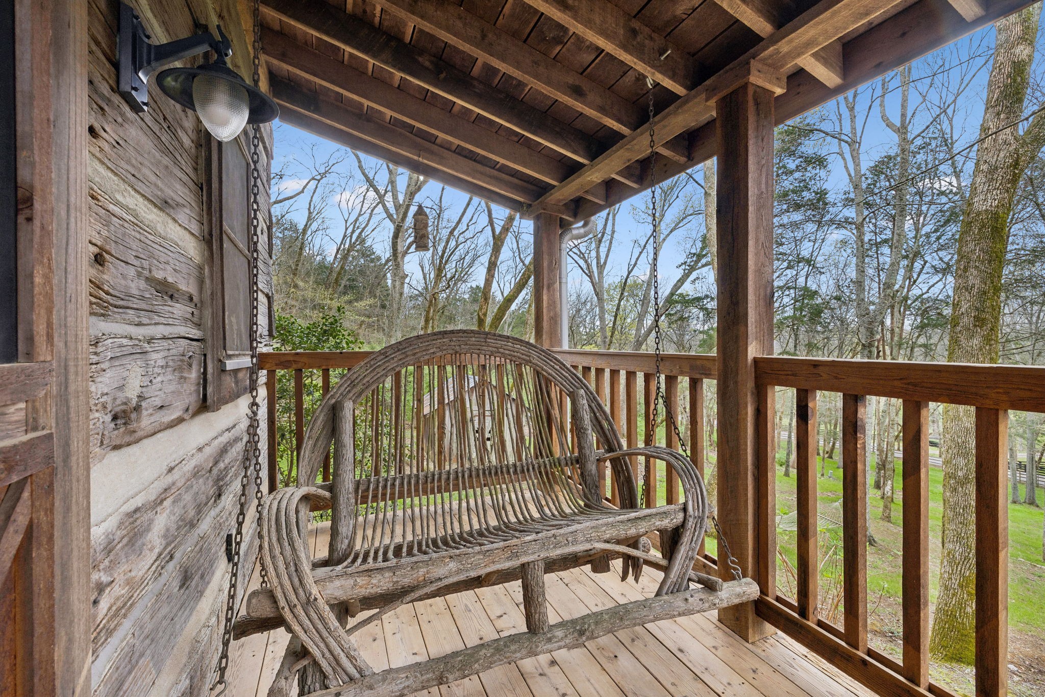 3110 McMillan Road Franklin, TN 37064 - Photo 41 of 96 a view of a chair and table in the balcony
