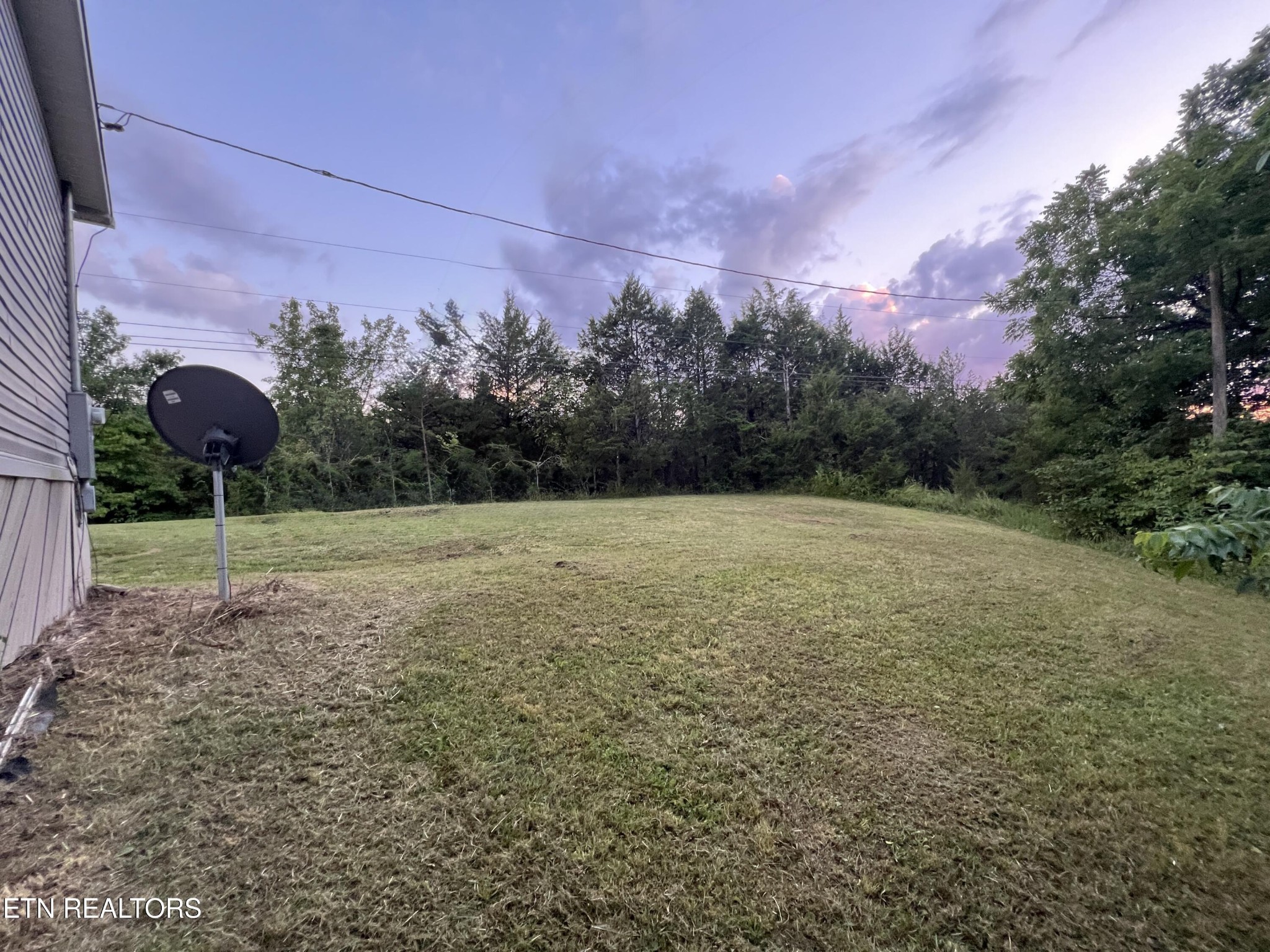 10207 Alex Bales Road Kodak, TN 37764 - Photo 17 of 18 a view of a backyard