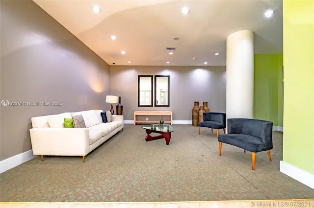 a living room with furniture and a couch