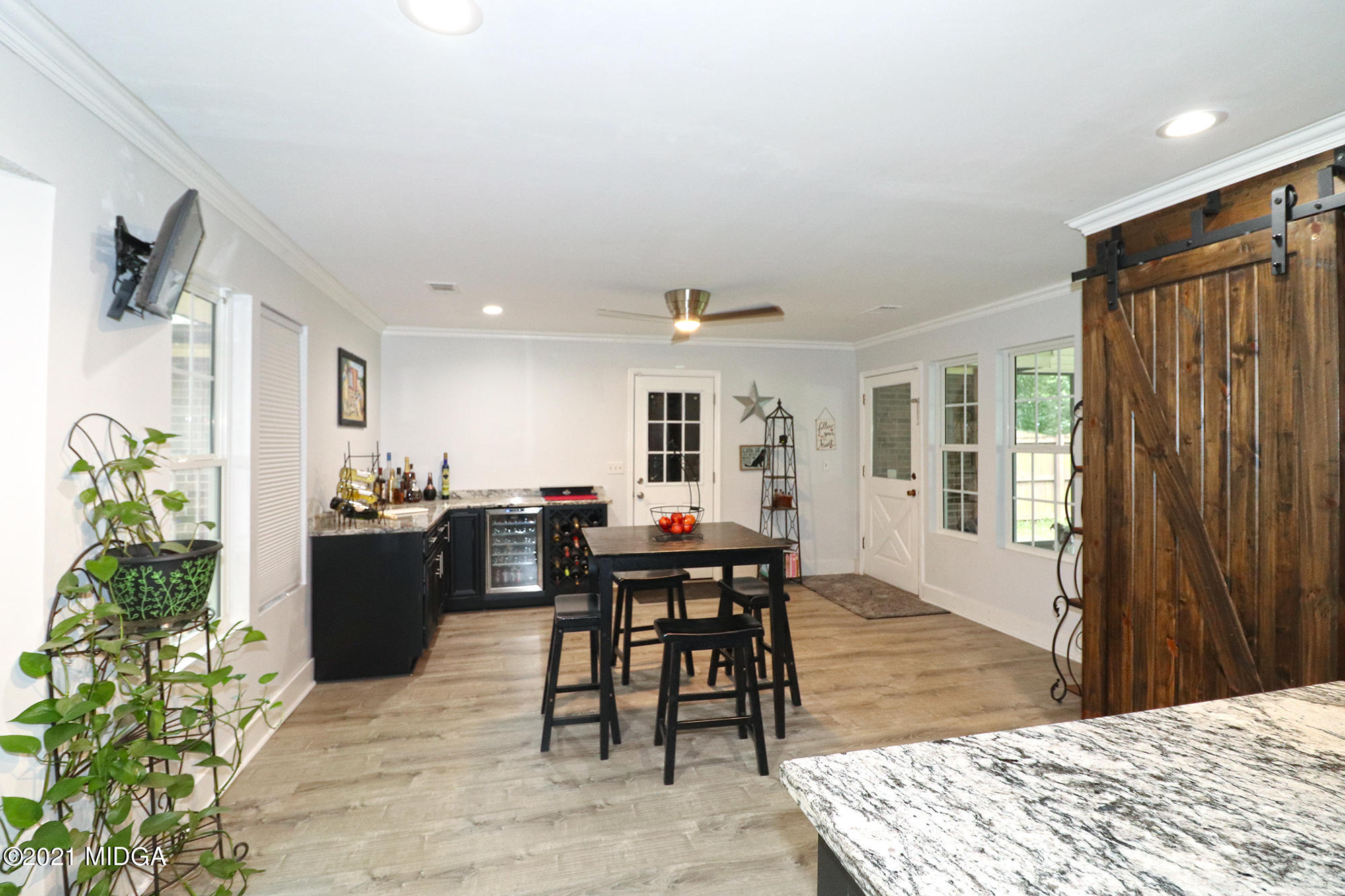 1571 Walker Road Byron, GA 31008 - Photo 13 of 60 a view of a dining room with furniture