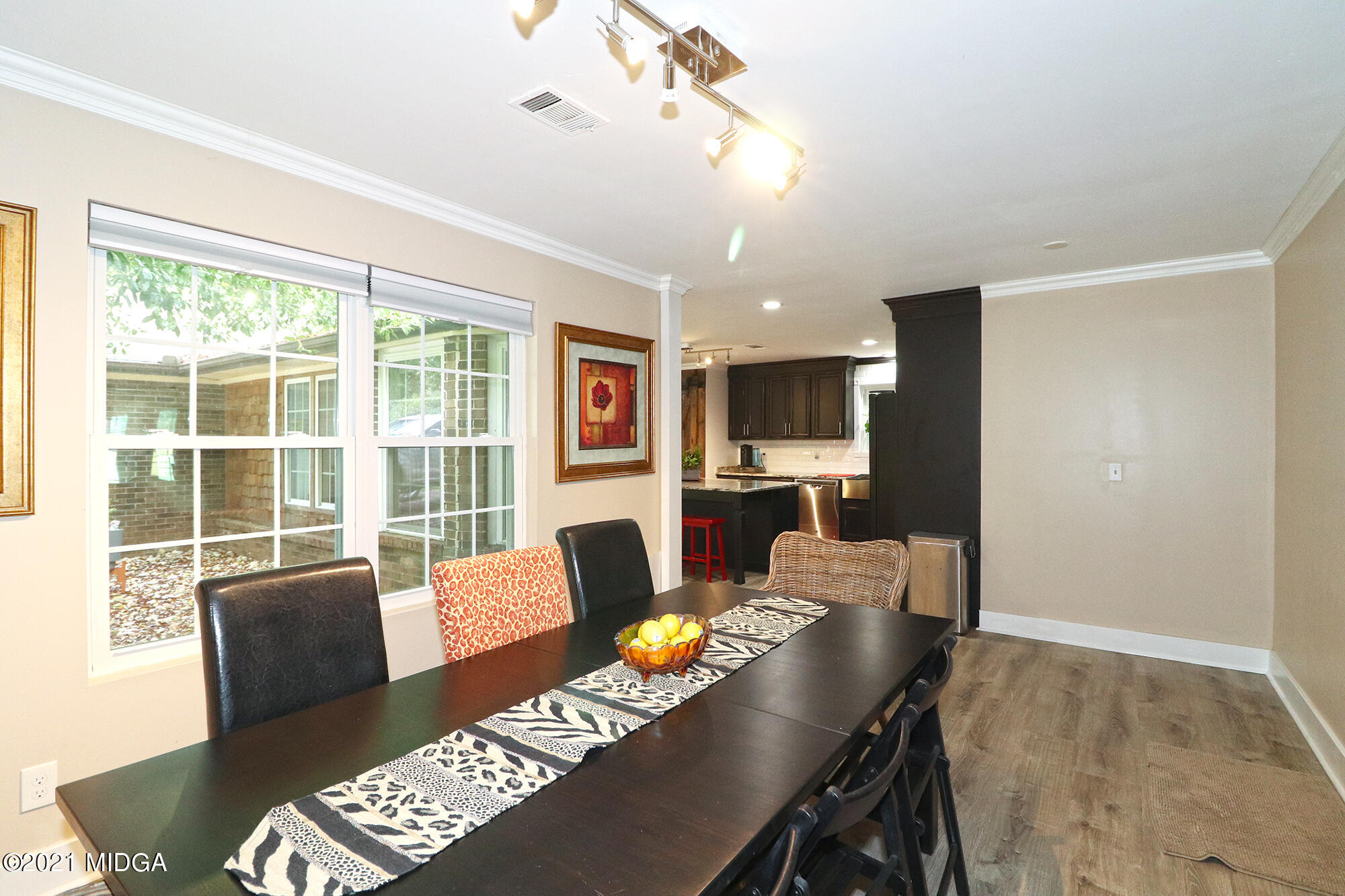 1571 Walker Road Byron, GA 31008 - Photo 14 of 60 a living room with furniture and a large window