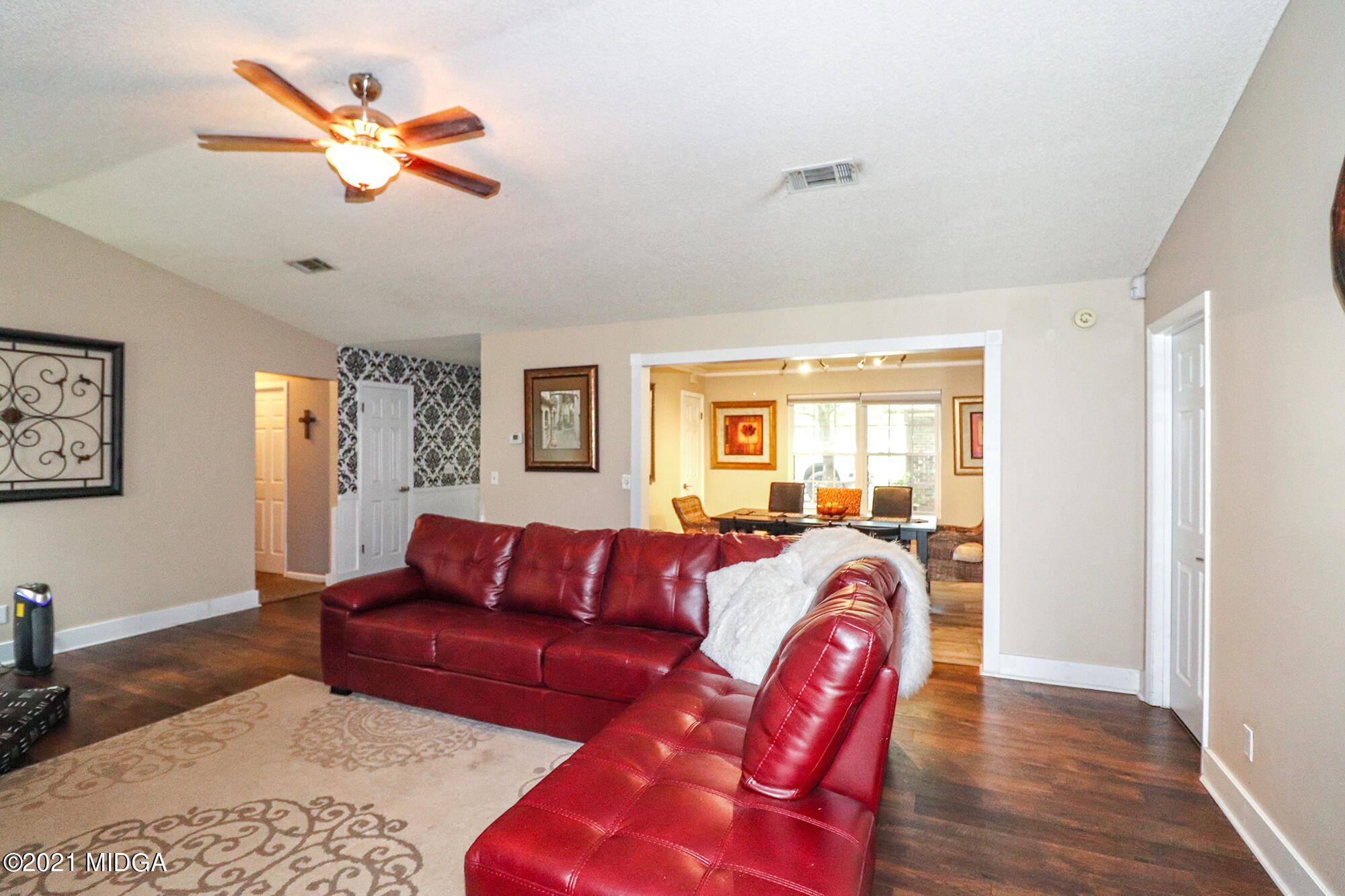 1571 Walker Road Byron, GA 31008 - Photo 17 of 60 a living room with furniture