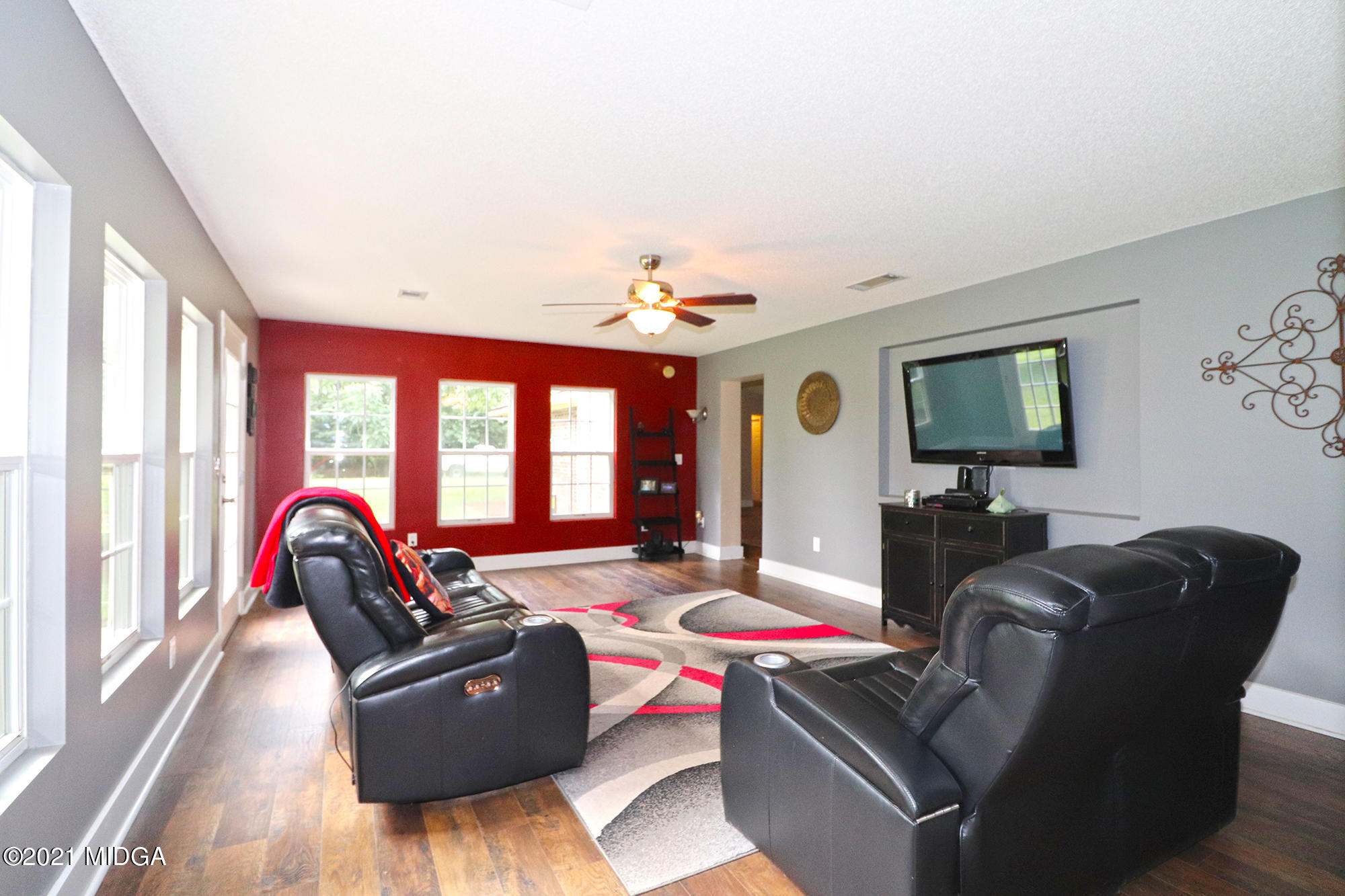 1571 Walker Road Byron, GA 31008 - Photo 20 of 60 a living room with furniture and a large window