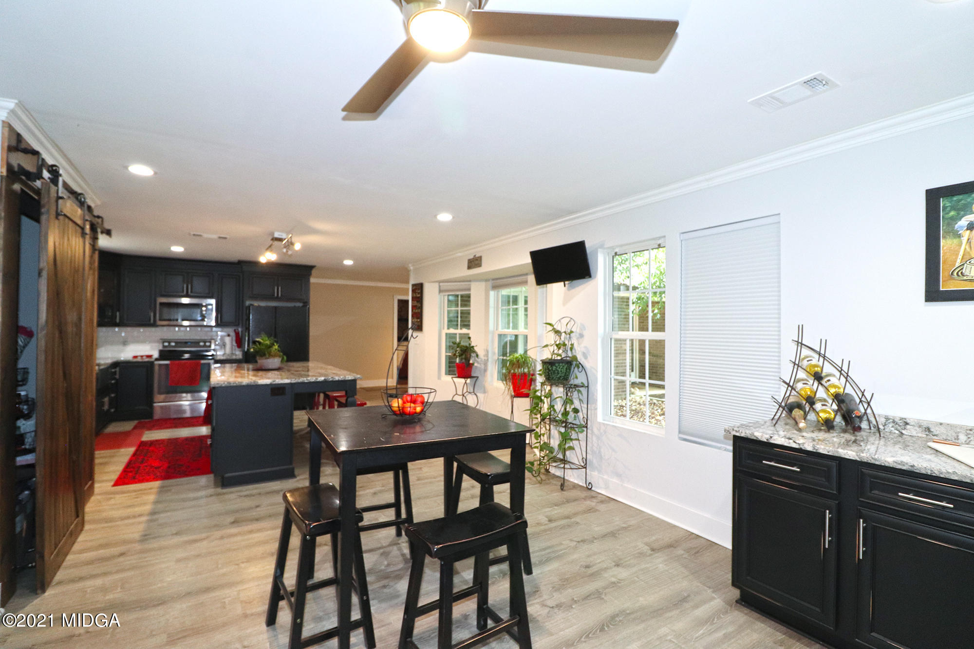1571 Walker Road Byron, GA 31008 - Photo 4 of 60 a view of a dining room with furniture