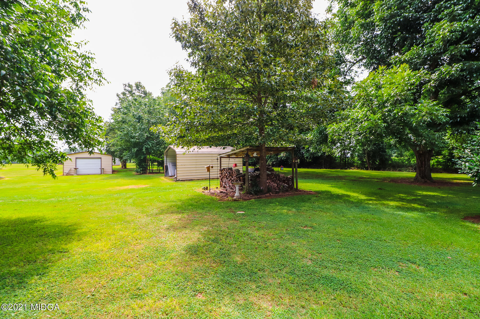 1571 Walker Road Byron, GA 31008 - Photo 46 of 60 a view of a house with a big yard