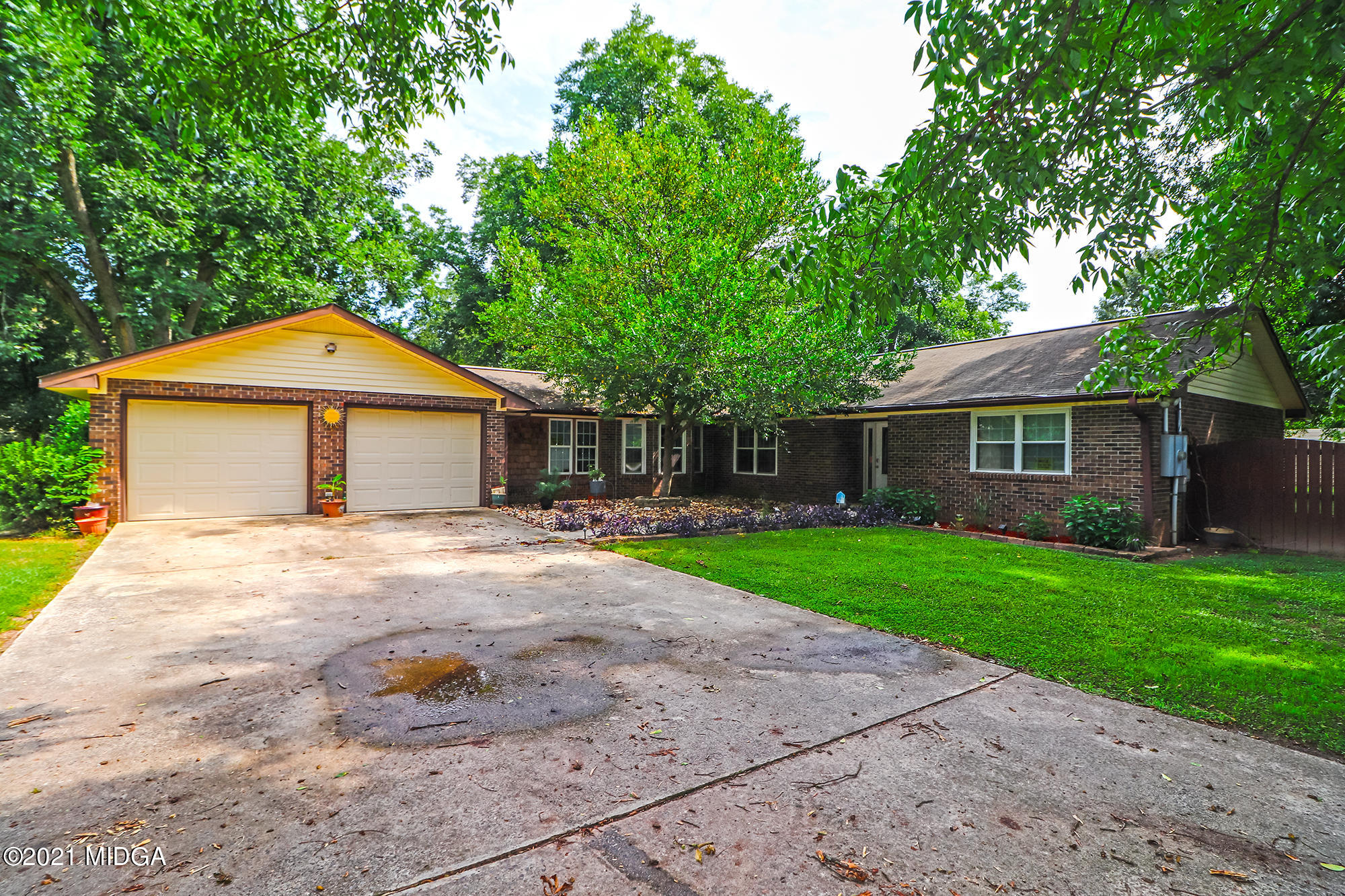1571 Walker Road Byron, GA 31008 - Photo 47 of 60 a front view of a house with a yard and trees