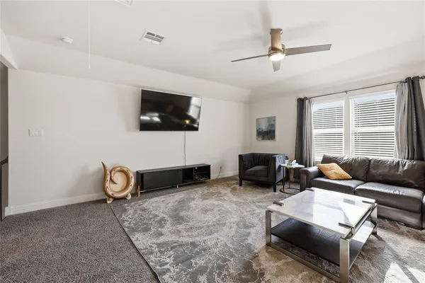 a bathroom with a bathtub a sink and a mirror