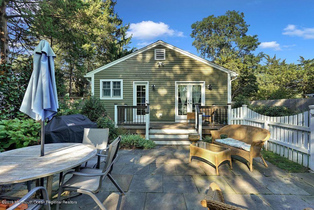 907 Brooks Road Point Pleasant, NJ 08742 - Photo 27 of 33 a view of a house with backyard and sitting area