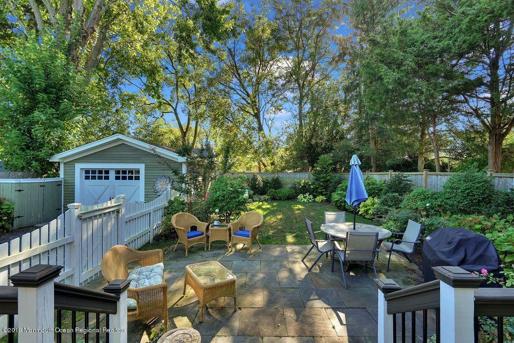 907 Brooks Road Point Pleasant, NJ 08742 - Photo 29 of 33 a view of a chairs and table in backyard