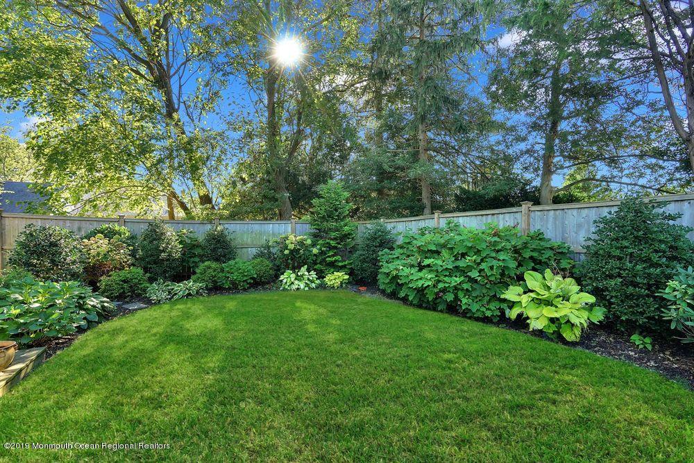 907 Brooks Road Point Pleasant, NJ 08742 - Photo 30 of 33 a view of a garden with a tree
