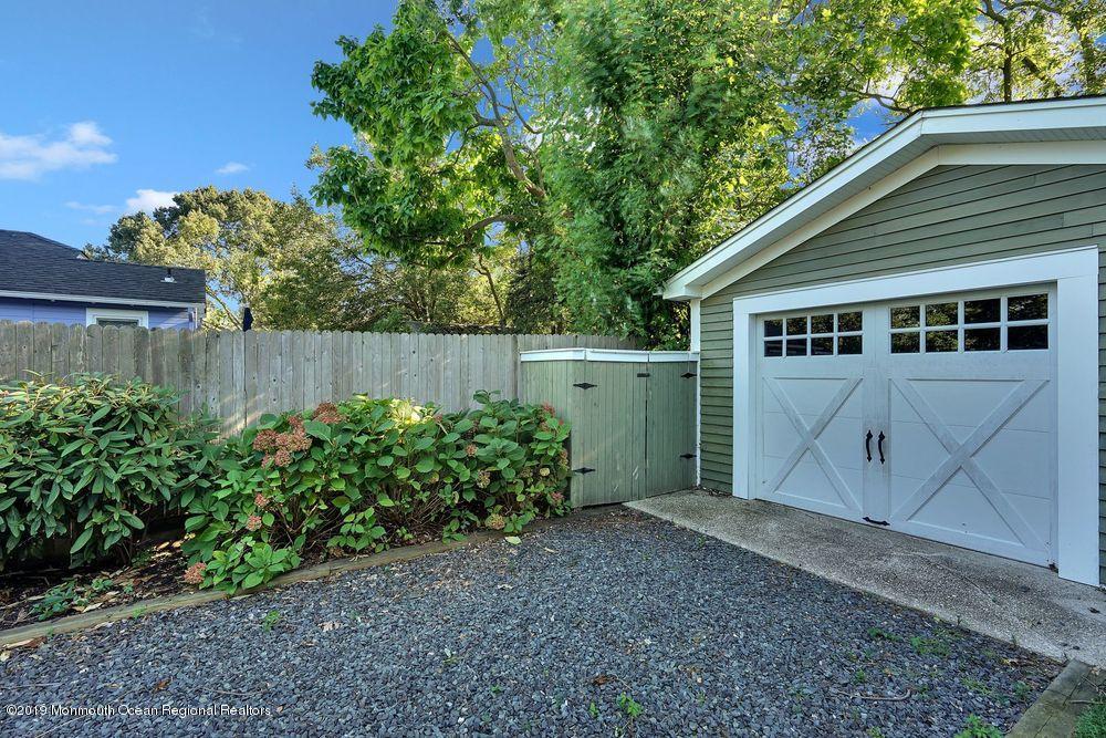 907 Brooks Road Point Pleasant, NJ 08742 - Photo 31 of 33 a view of a house with a backyard