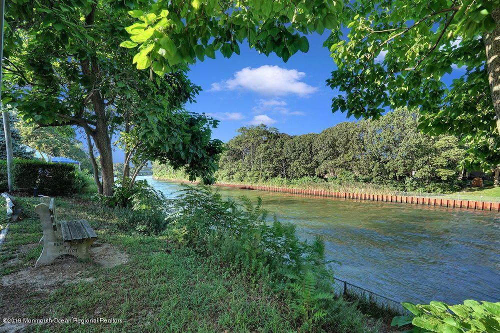907 Brooks Road Point Pleasant, NJ 08742 - Photo 33 of 33 a view of a lake with a yard