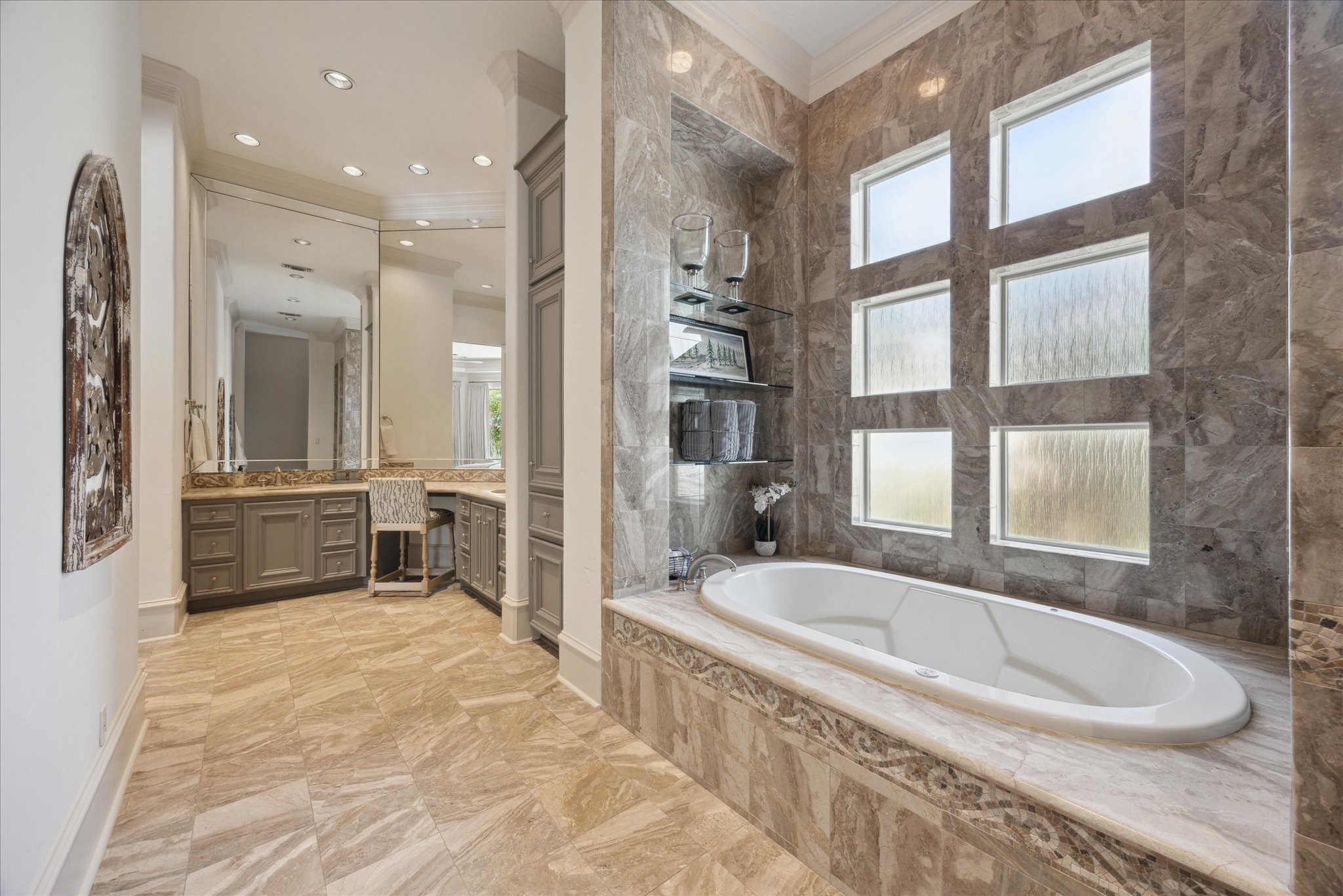 11607 Barazi Oaks Court Houston, TX 77024 - Photo 20 of 43 a large spacious bathroom with a tub a double vanity sink a mirror and a shower