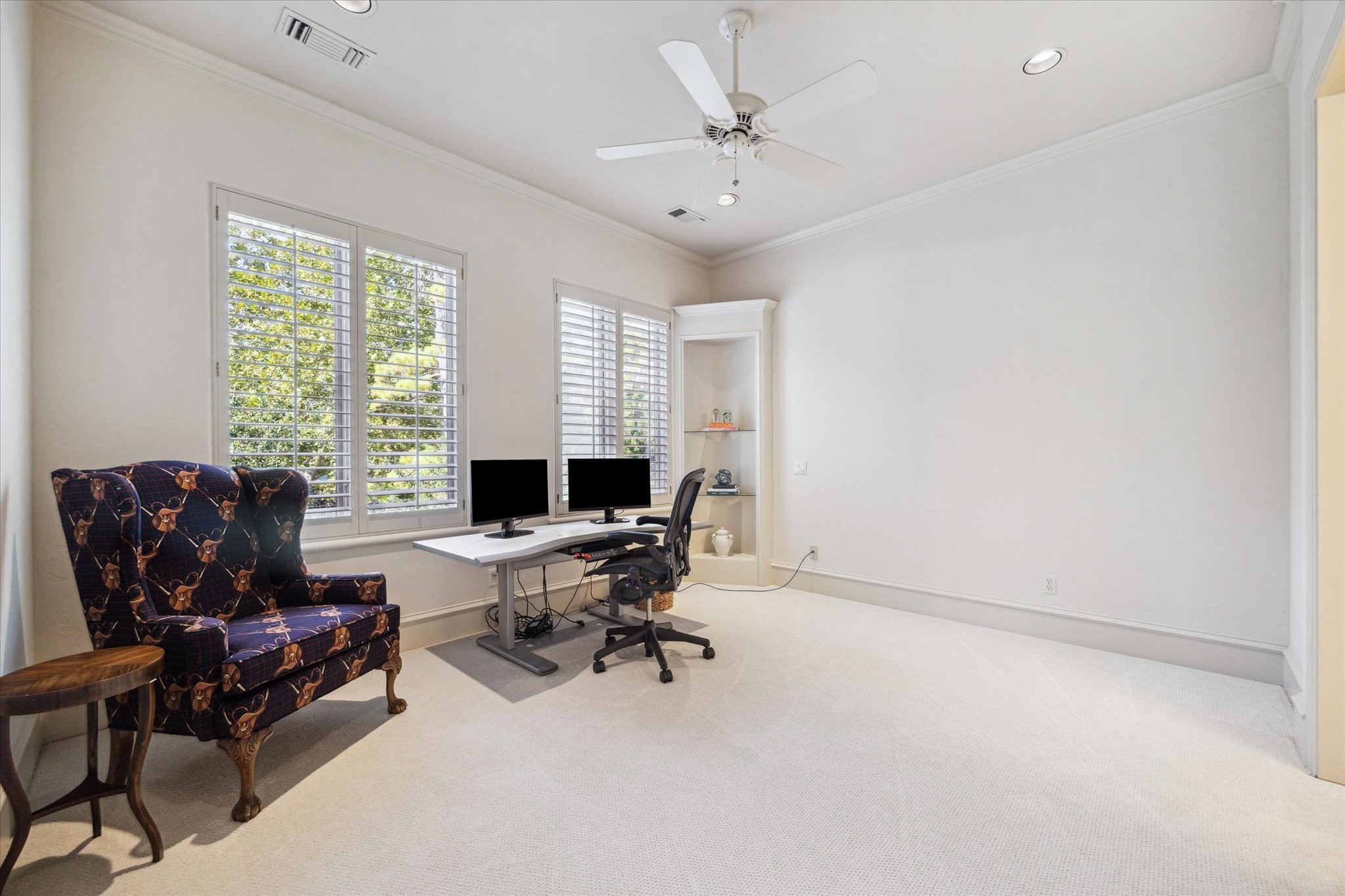 11607 Barazi Oaks Court Houston, TX 77024 - Photo 31 of 43 a view of a workspace with furniture and a window