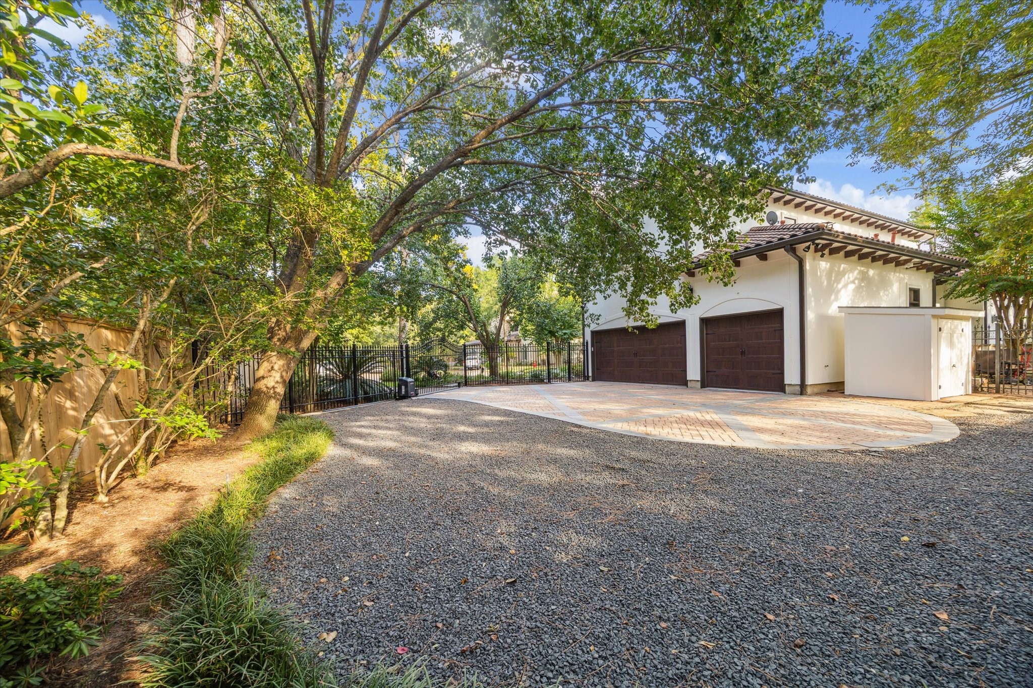 11607 Barazi Oaks Court Houston, TX 77024 - Photo 39 of 43 a view of a yard with a tree