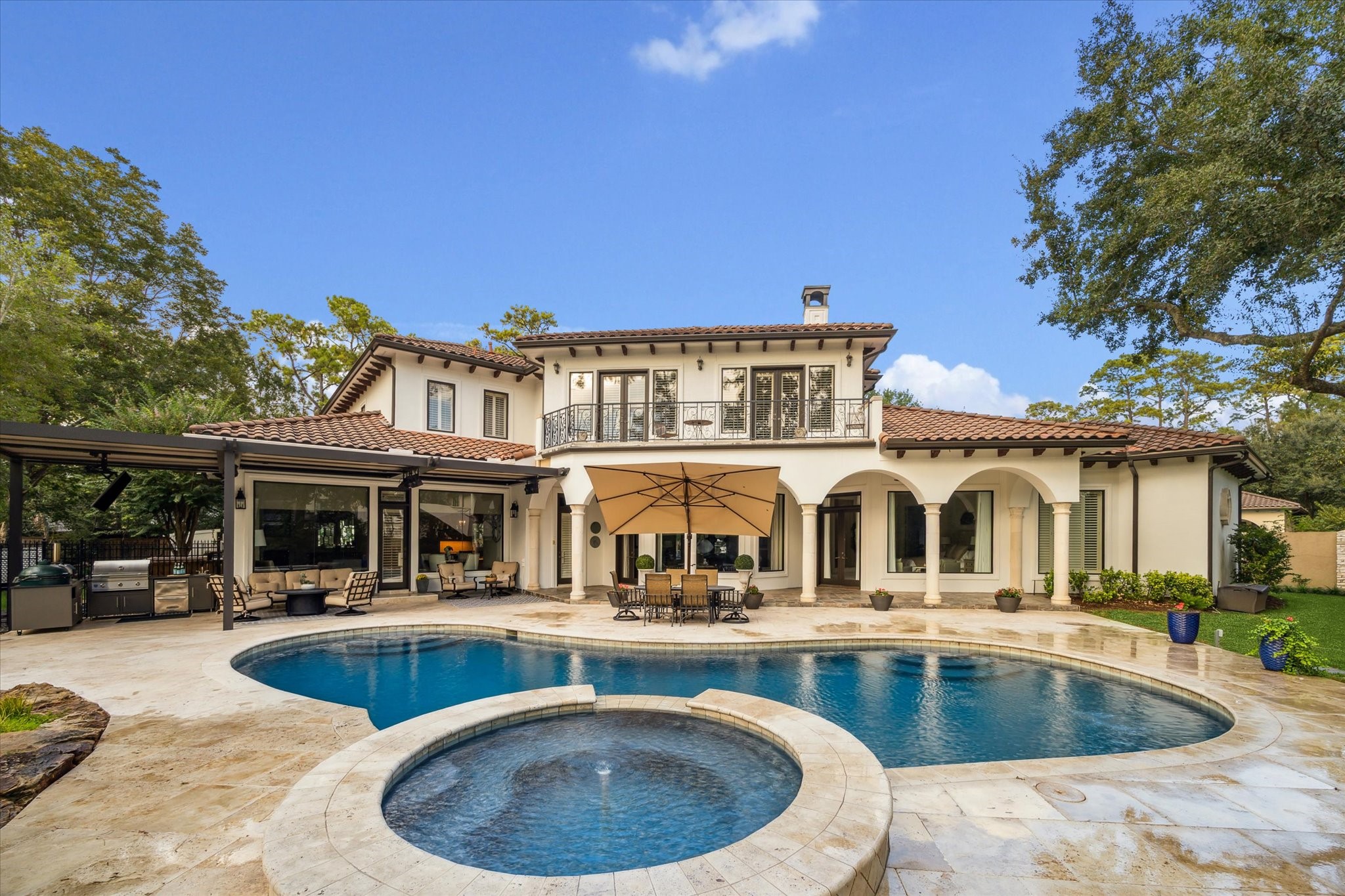 11607 Barazi Oaks Court Houston, TX 77024 - Photo 43 of 43 a view of a house with swimming pool