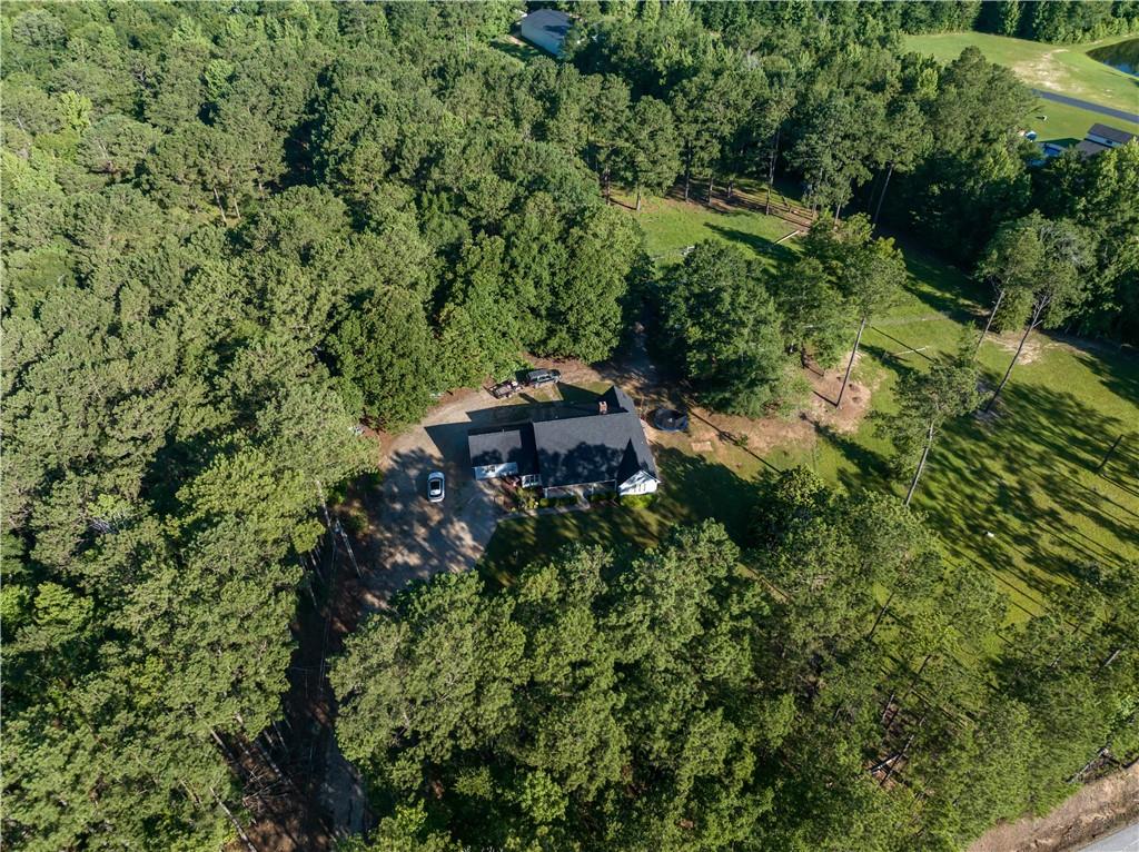62 McCarthy Road Opelika, AL 36804 - Photo 55 of 74 Property situated on a sizable lot surrounded by dense tree coverage