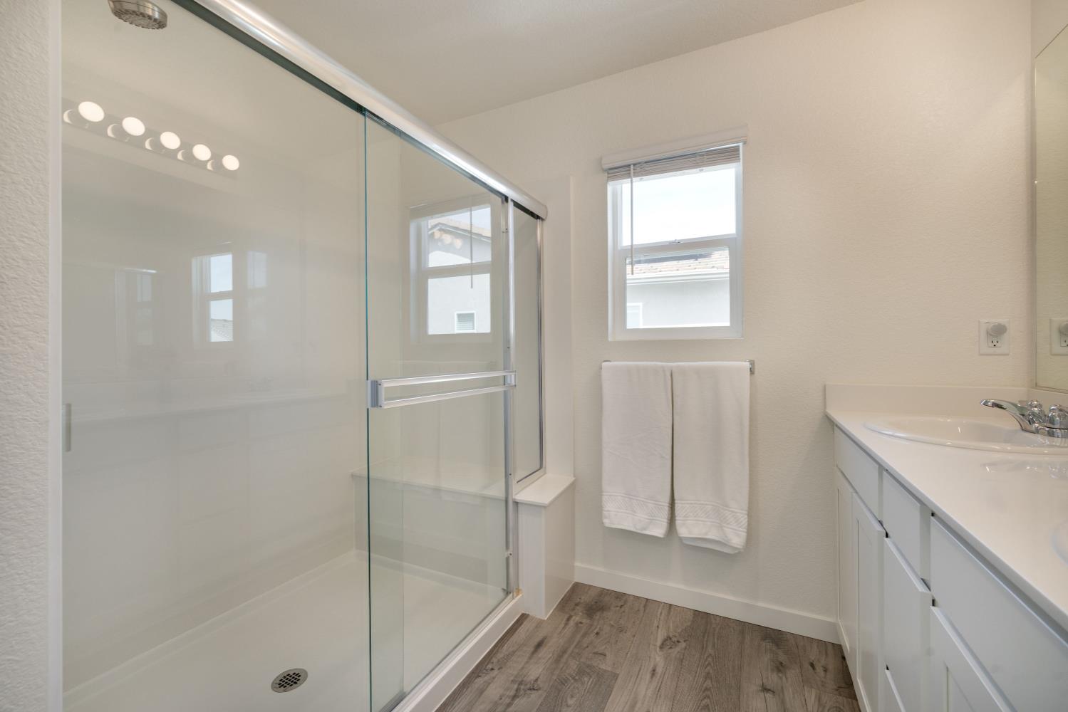 4041 Trailblazer Loop Roseville, CA 95747 - Photo 14 of 23 a bathroom with a shower and a sink