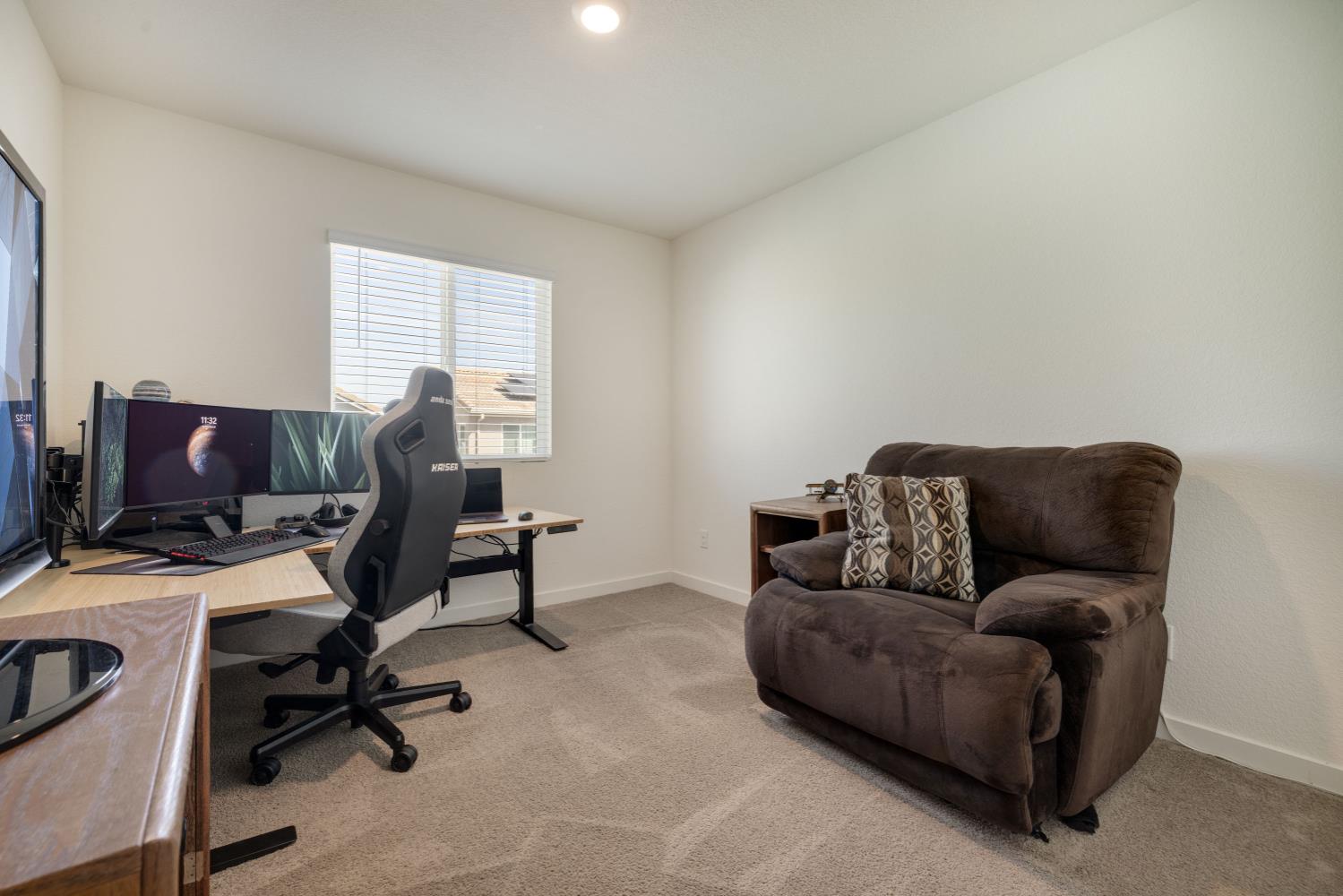 4041 Trailblazer Loop Roseville, CA 95747 - Photo 16 of 23 a livingroom with workspace couch and a window