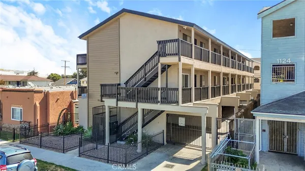 a front view of a building with balcony