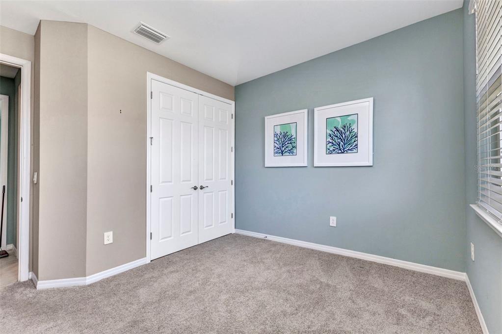 7028 North Plum Tree Punta Gorda, FL 33955 - Photo 13 of 57 an empty room with windows and closet