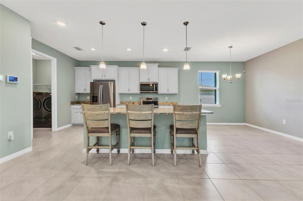 7028 North Plum Tree Punta Gorda, FL 33955 - Photo 22 of 57 a view of a dining area with furniture