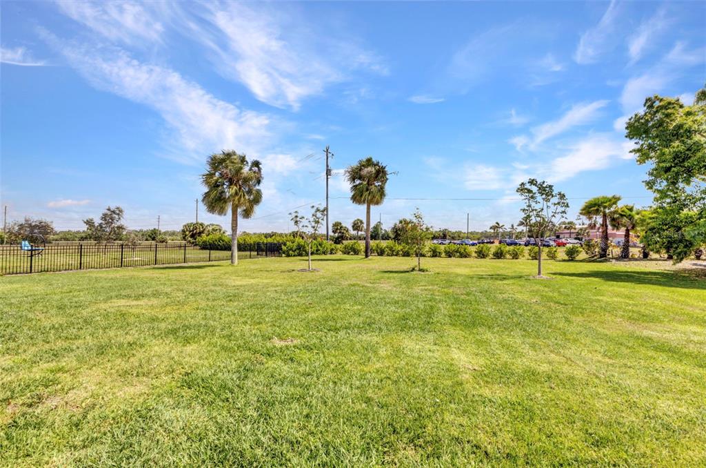 7028 North Plum Tree Punta Gorda, FL 33955 - Photo 40 of 57 a view of a golf course with the houses