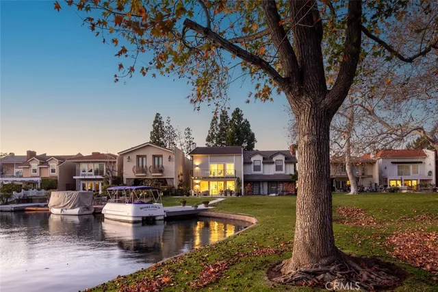 a view of a swimming pool with a table and chairs