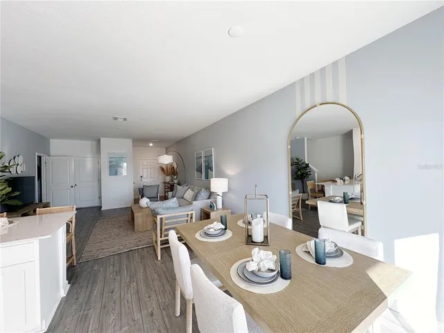 a kitchen with stove cabinets and refrigerator
