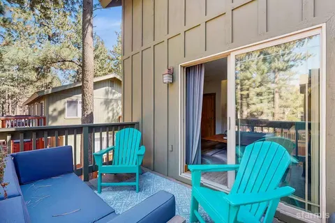 a view of front door with outdoor seating