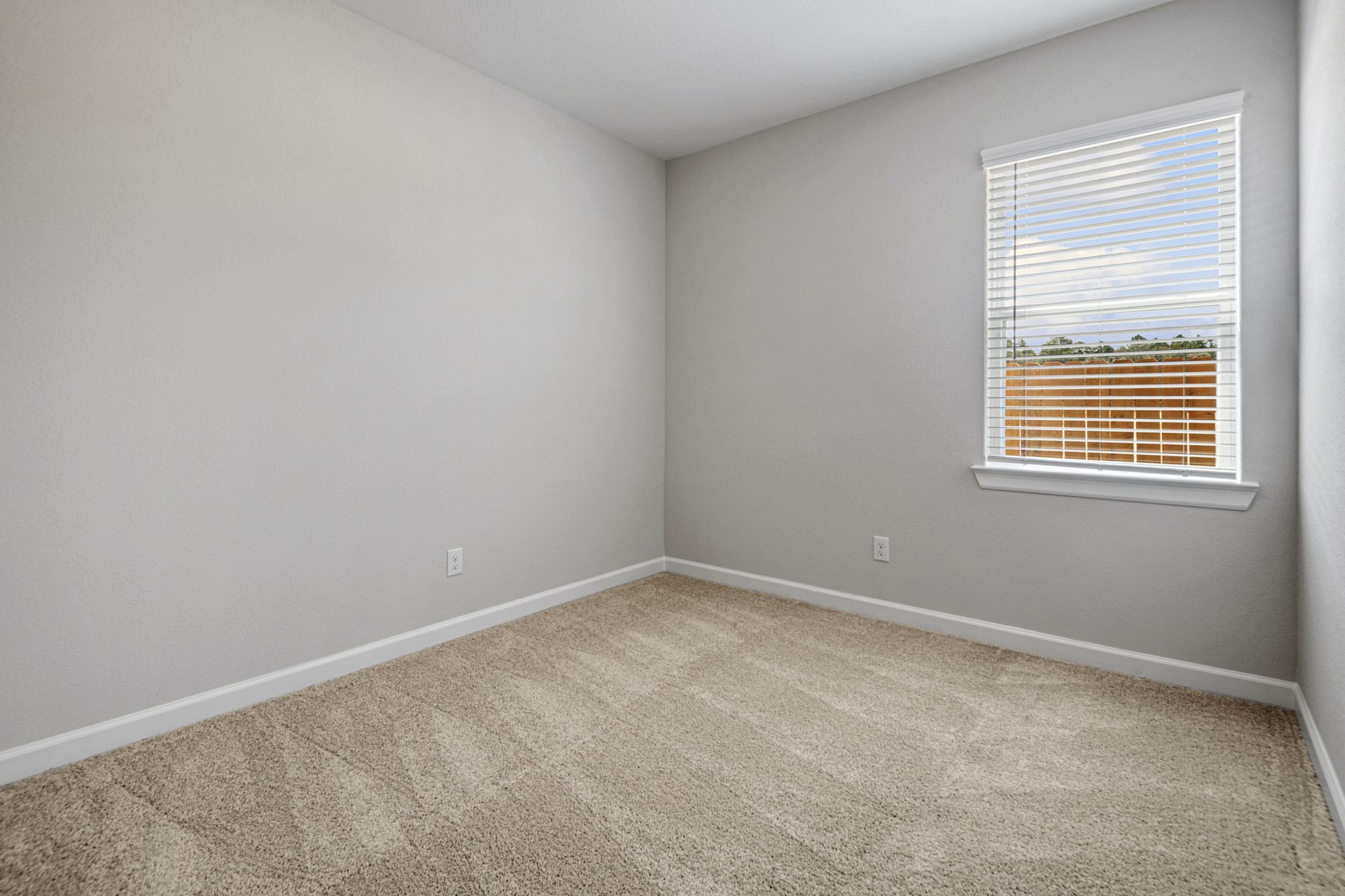 15683 Honey Cv Drive Conroe, TX 77303 - Photo 14 of 24 an empty room with a window