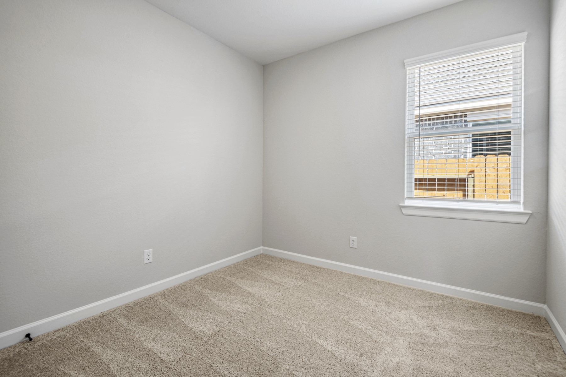 15683 Honey Cv Drive Conroe, TX 77303 - Photo 15 of 24 an empty room with a window