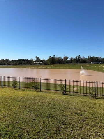 a view of park with a lake view