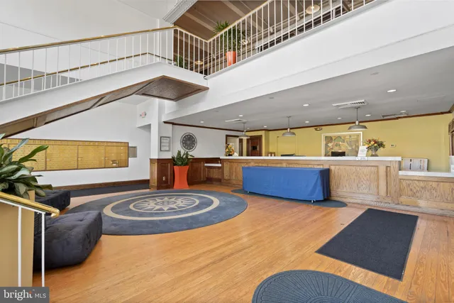 a view of a kitchen with a sink and dishwasher