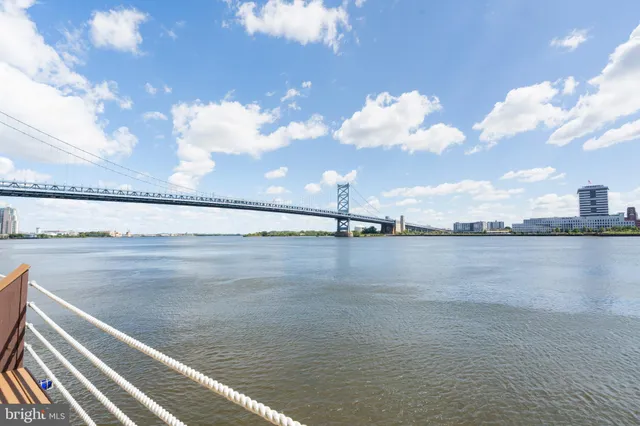 a view of a city with lawn chairs