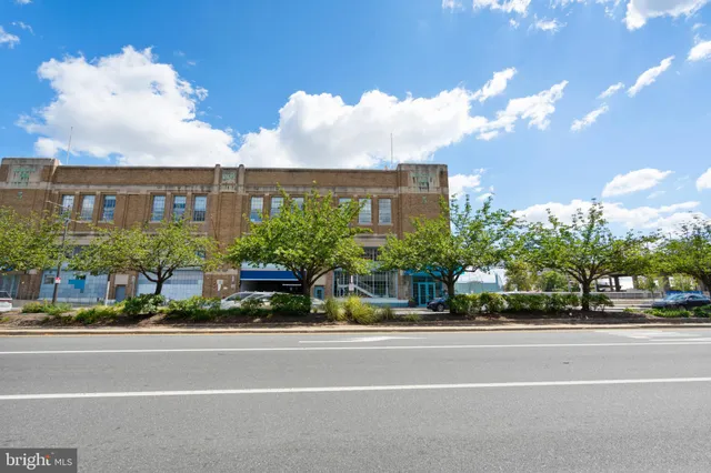 a view of a building with a street