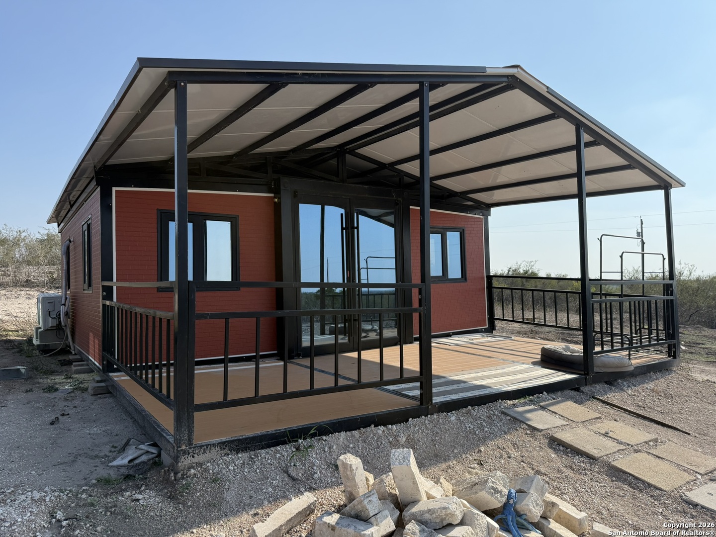 1331 Highway 281 George West, TX 78022 - Photo 7 of 14 a view of a backyard with wooden floor and iron fence