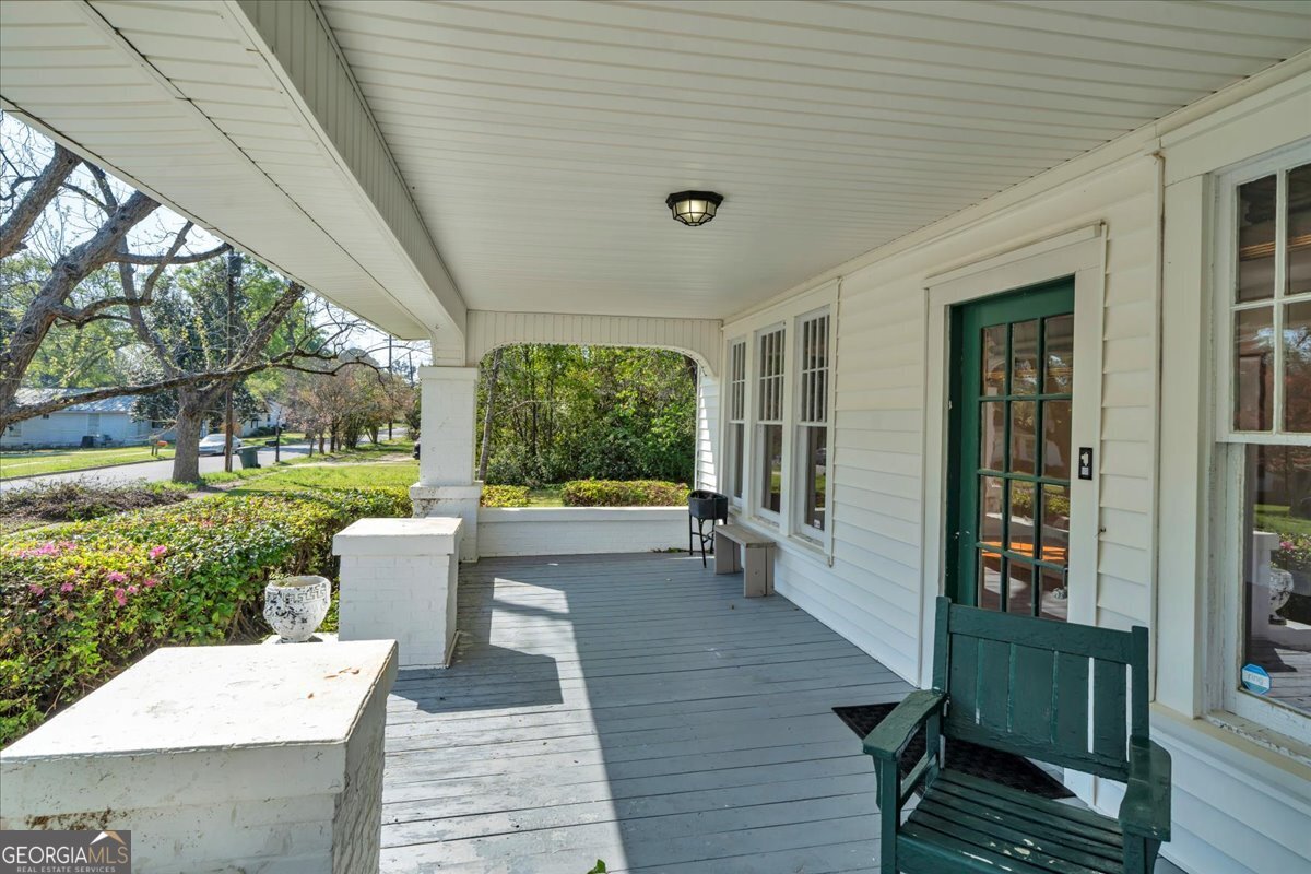 218 West Drive Dublin, GA 31021 - Photo 3 of 49 a house view with a sitting space and garden