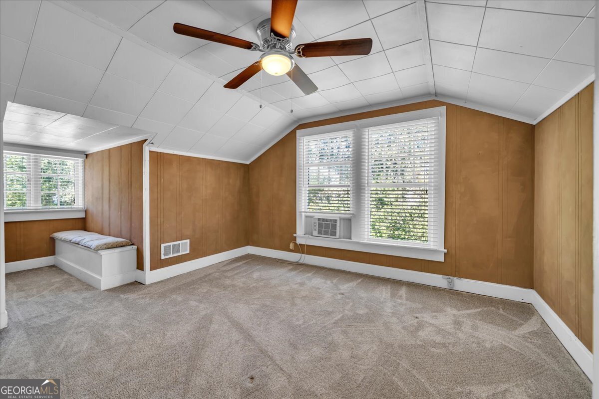 218 West Drive Dublin, GA 31021 - Photo 31 of 49 an empty room with windows