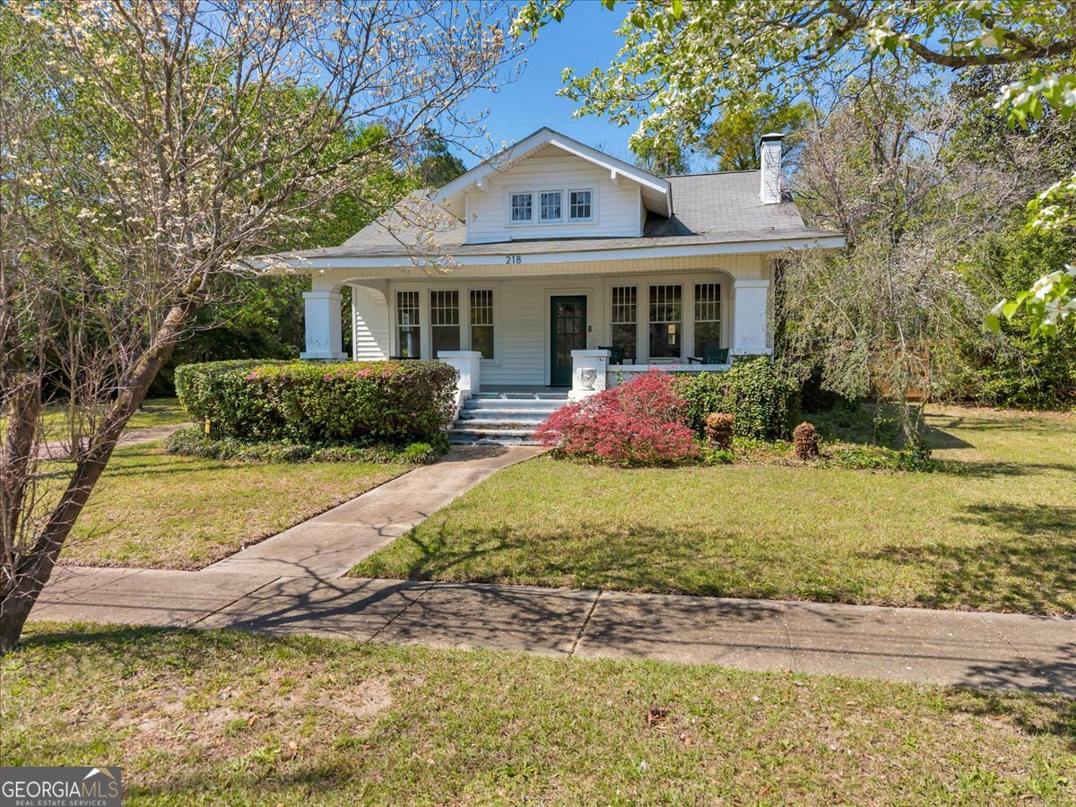 218 West Drive Dublin, GA 31021 - Photo 39 of 49 a front view of a house with a yard