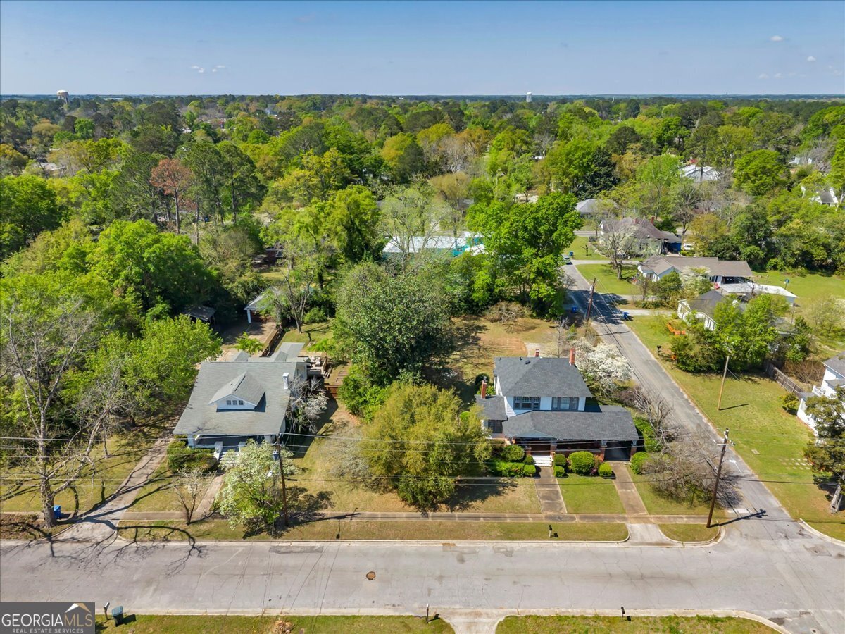 218 West Drive Dublin, GA 31021 - Photo 47 of 49 an aerial view of residential houses with outdoor space and trees
