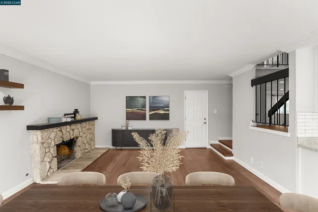 a large white kitchen with a large window